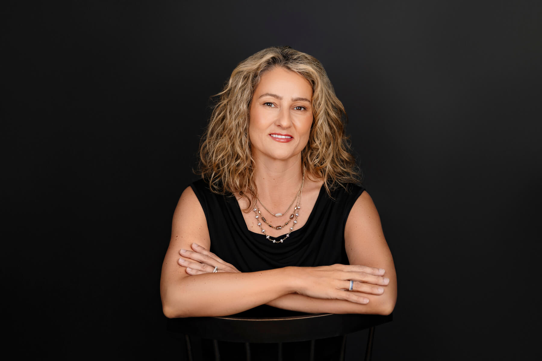 Woman with soft curls Headshot at studio, in Lexington, Massachusetts