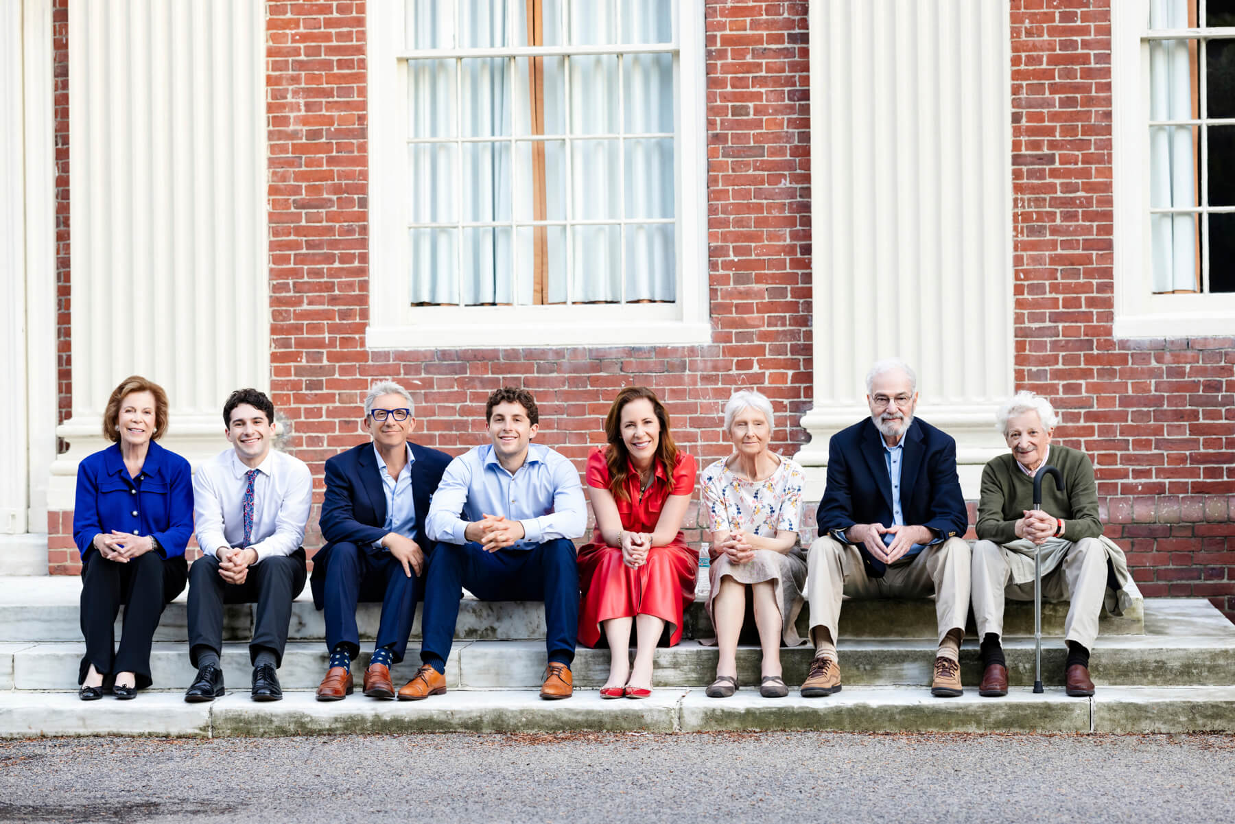 Extended Family photo sitting in front of Harvard University, Massachusetts