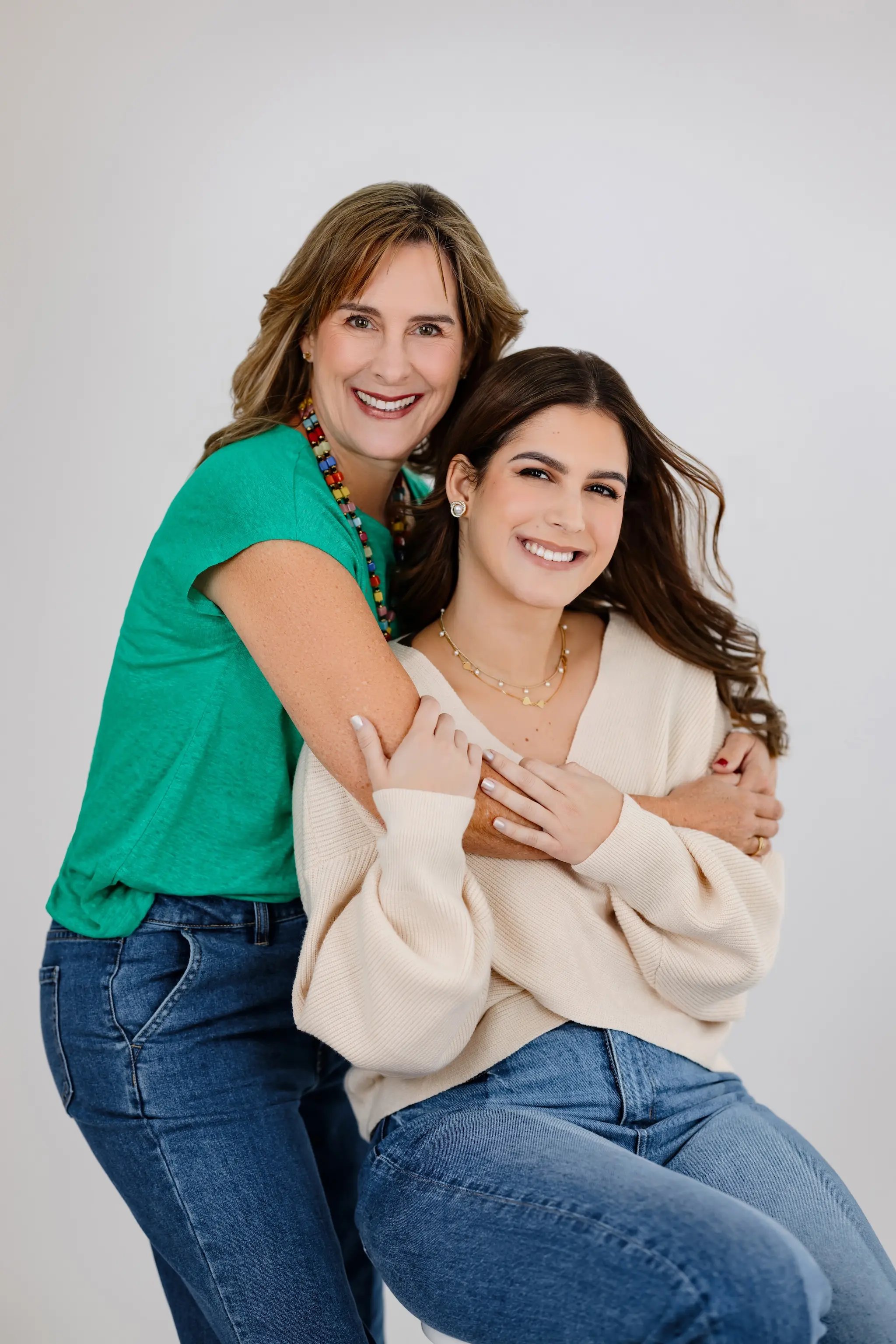 family-studio-mother-arms-around-daughter