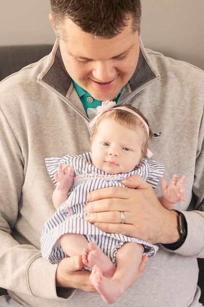 Dad and baby moments in Home Family Photo Session