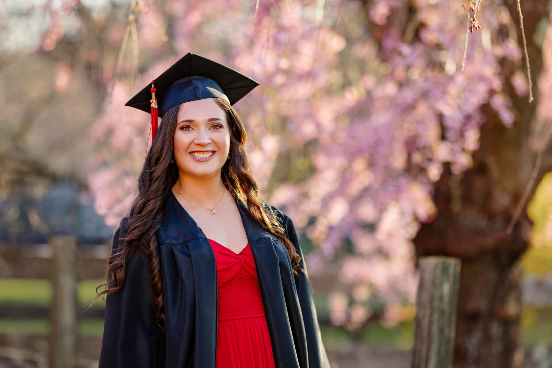 Senior Girl with cap & gown , in Lexington, Massachusetts