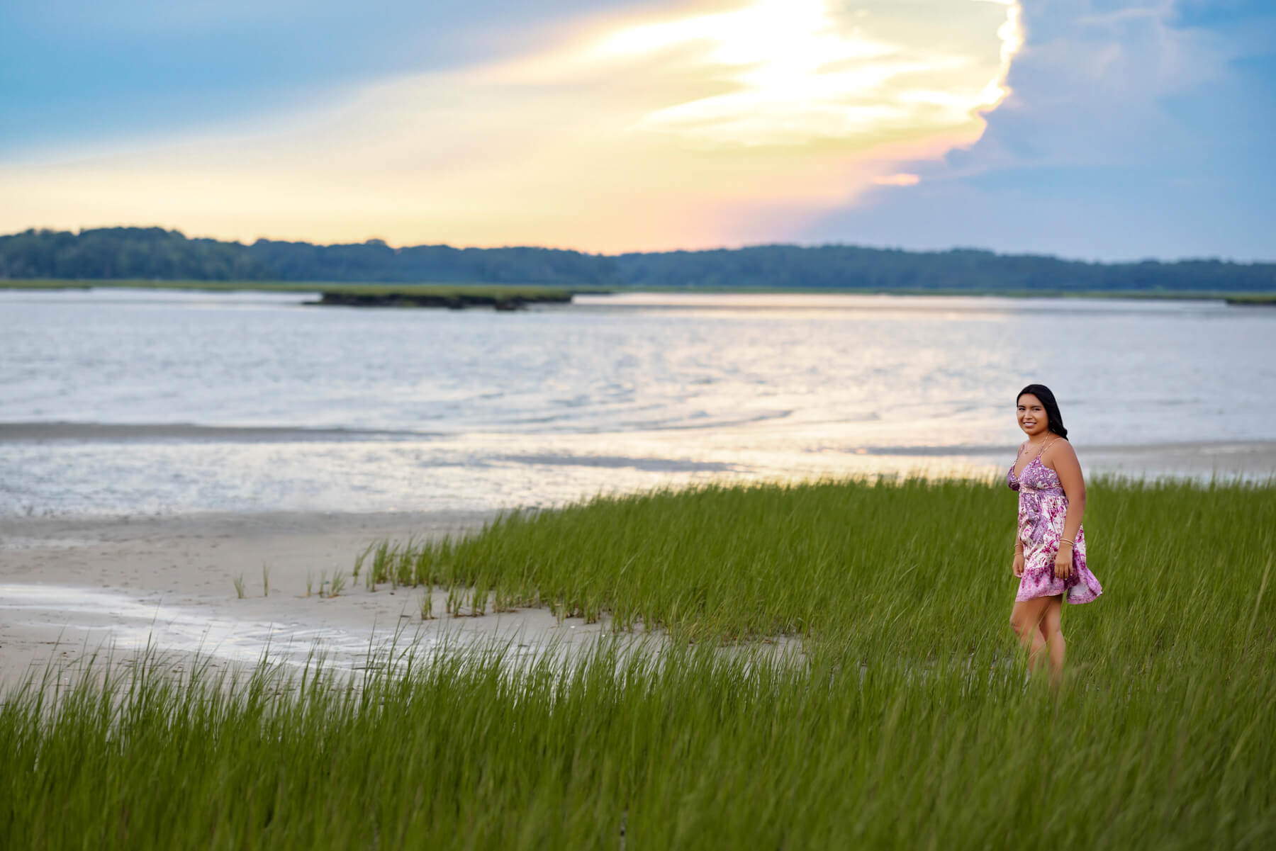 High School senior girl walking in the beach at sunset, at Massachusetts