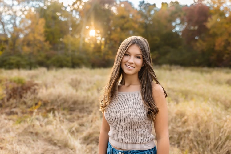 senior portrait_teen girl smiles in field - outdoor Boston photography