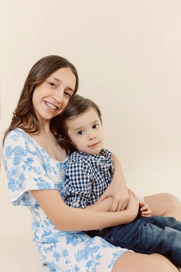 a studio photo of siblings in Boston studio